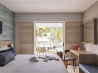 Resort-Spa-Peppers-Beach-Club-and-Spa-Bedroom