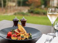 Corn fed Thirlmere chicken breast, potato gnocchi, oven roasted truss cherry tomatoes, gremolata, prosciutto crisp  