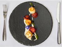 Seared scallops & Rodriquez spiced chorizo, cauliflower puree, squid ink meringue, coriander oil